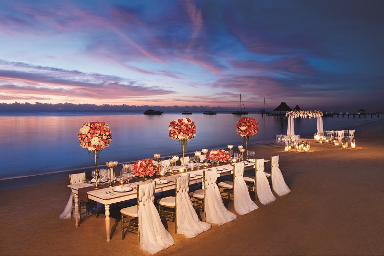 Beach wedding setup at Zoetry Paraiso de la Bonita in Mexico