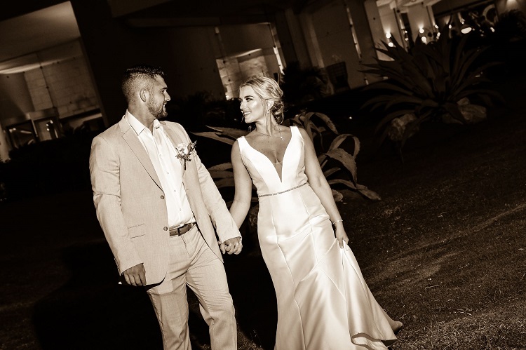 wedding couple looking at each other