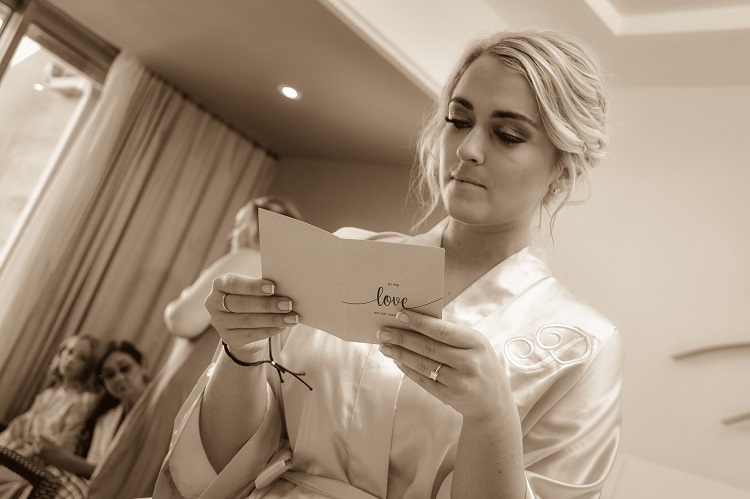 Bride reading love letter