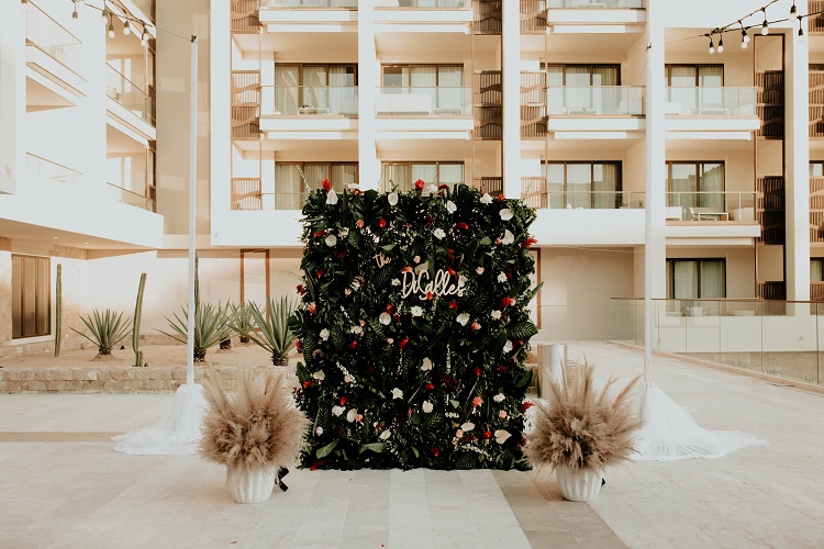 destination wedding reception floral wall