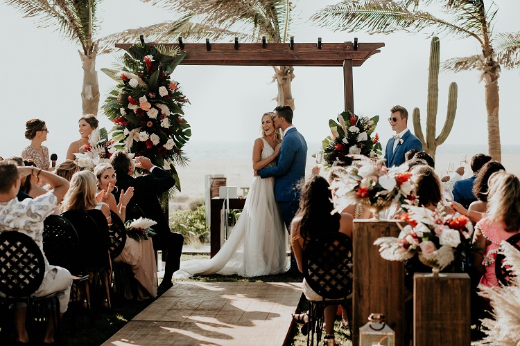 bride and groom at altar