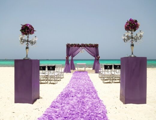purple beach wedding ceremony