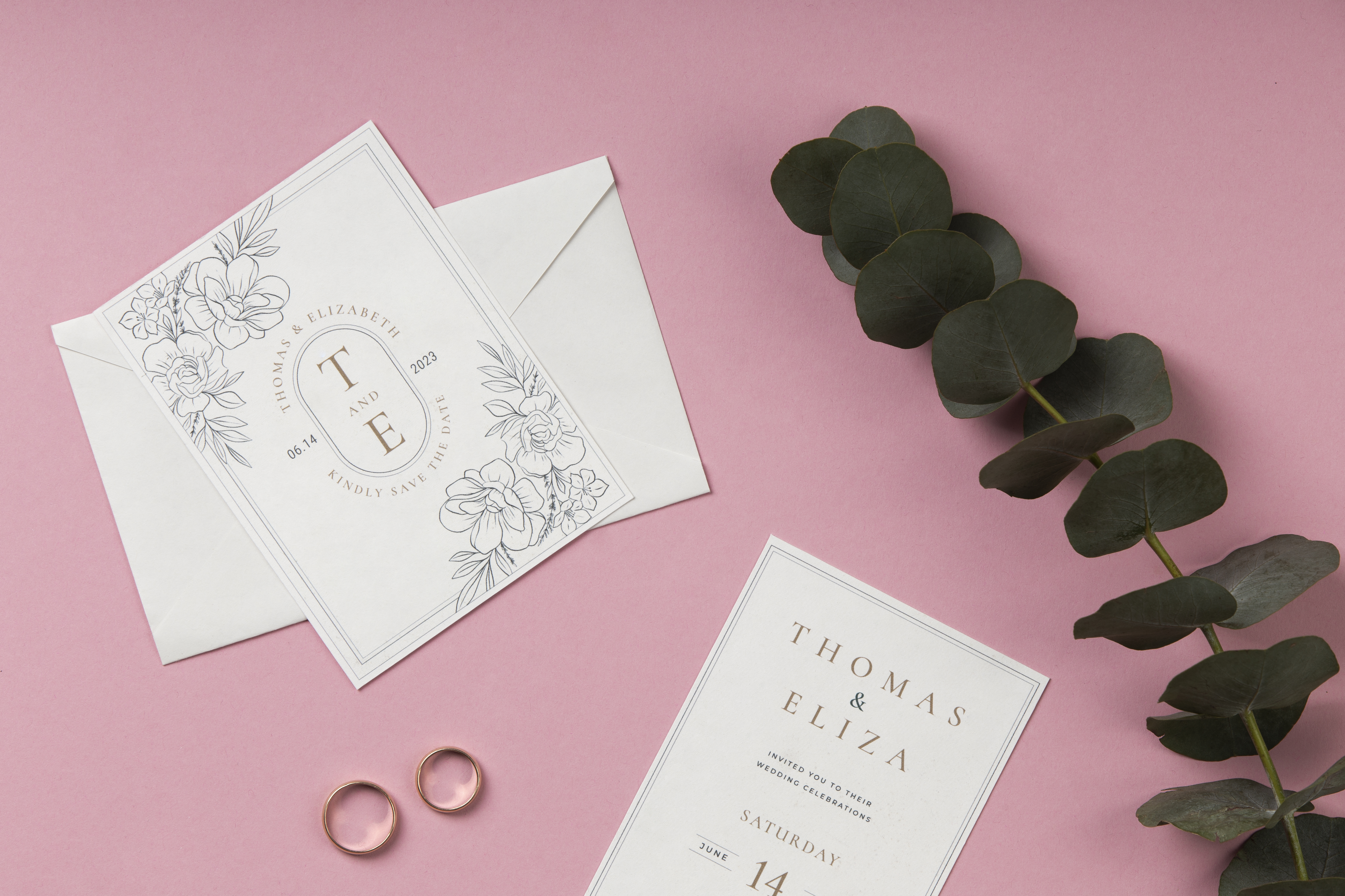 Wedding planning materials laid out on a desk