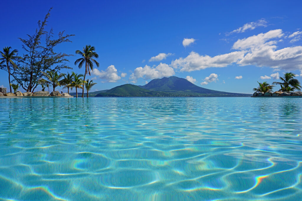 View,Of,The,Nevis,Peak,Volcano,From,A,Swimming,Pool